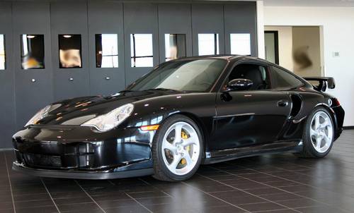 I am pleased to present this stunning 2003 Porsche 911 GT2 in Basalt Black 
